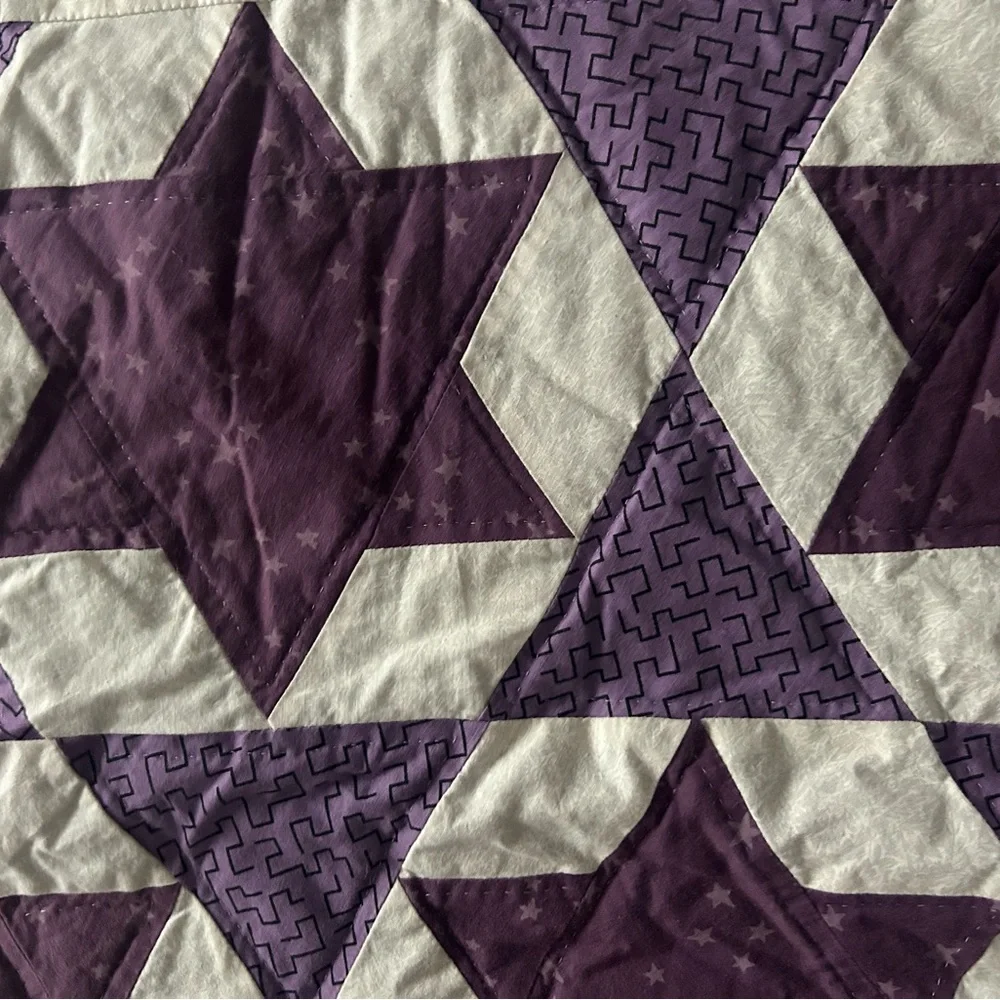 Quilted handcrafted wall hanging purple stars